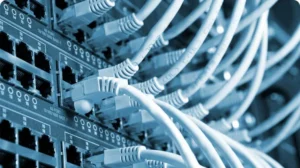 Patch panel and network switch with ethernet cabling supporting fast business WiFi on Long Island.