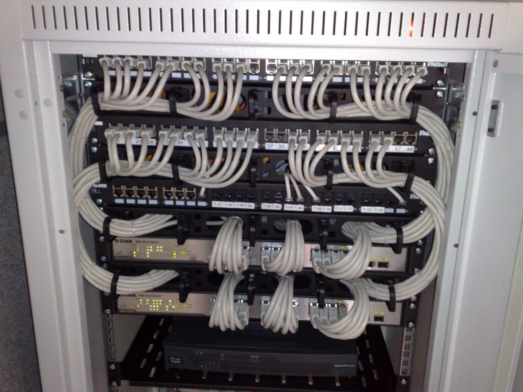 Server rack with Ethernet switches and patch panels ready to move